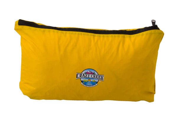 Yellow pouch with a black zipper and 'Crazy Creek' logo on a white background