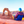 Woman sitting in front of Zion rocks in Utah while sitting in her blue crazy creek chair